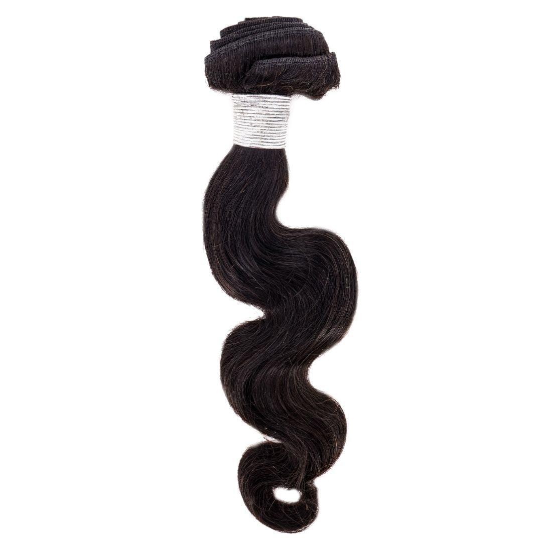 One bundle of black Brazilian Body Wave hair extensions tightly wrapped at one end with silver string.