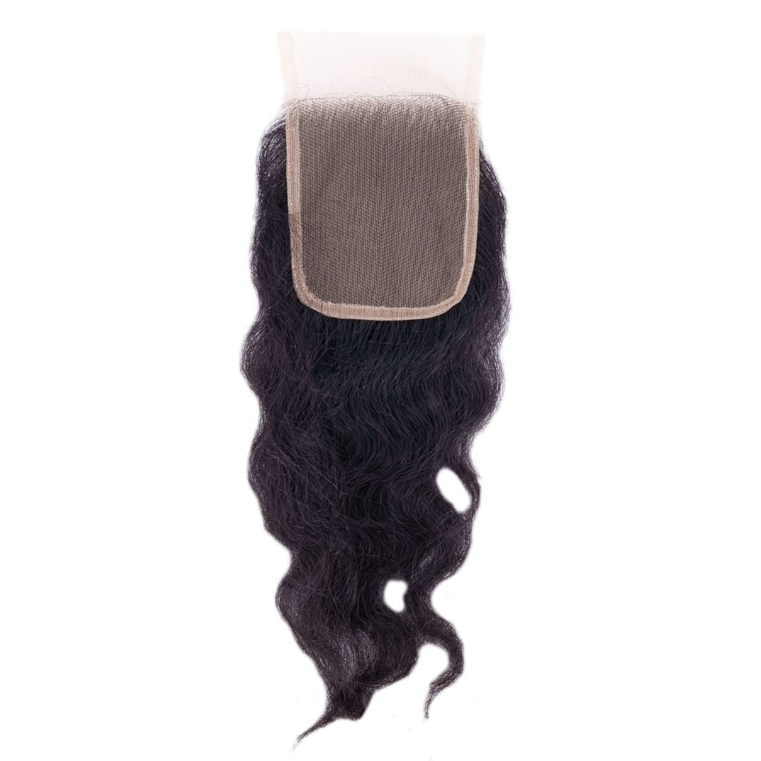 The Raw Indian Curly Closure  made from 100% human hair, is displayed against a white background. 