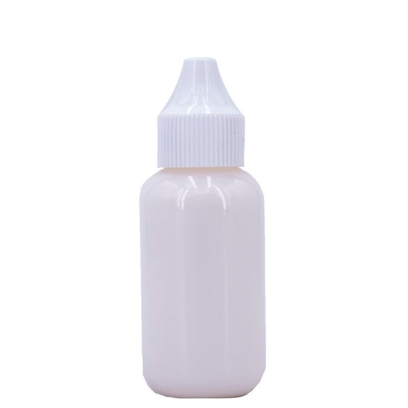 A small, opaque white plastic bottle of Lace Paste Xtra Hold from hairdiamondz, featuring a ribbed screw cap and a narrow, pointed nozzle for dispensing lace frontal glue or similar non-toxic liquids, stands upright against a plain white background.